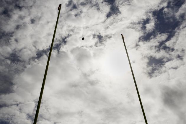 A football flies through the goalposts during warm ups before an NFL football game between the Baltimore Ravens and the Cincinnati Bengals in Baltimore, Sunday, Sept. 27, 2015. (AP Photo/Patrick Semansky)
