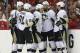Pittsburgh Penguins left wing Carl Hagelin (62) celebrates his goal against the Washington Capitals with teammates during the second period of Game 2 in an NHL hockey Stanley Cup Eastern Conference semifinals Saturday, April 30, 2016 in Washington. (AP Photo/Pablo Martinez Monsivais)