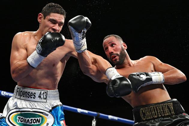 WASHINGTON, DC - APRIL 30: James DeGale of England (right) exchanges punches with Rogelio Medina of Mexico in their IBF super middleweights championship bout at the DC Armory on April 30, 2016 in Washington, DC. (Photo by Patrick Smith/Getty Images)