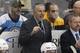 Calgary Flames head coach Bob Hartley gives instructions during an NHL hockey game against the Pittsburgh Penguins in Pittsburgh, Saturday, March 5, 2016. (AP Photo/Gene J. Puskar)