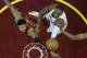 Cleveland Cavaliers' LeBron James (23) shoots between Atlanta Hawks' Kent Bazemore (24) and Al Horford (15), from Dominican Republic, in the second half in Game 1 of a second-round NBA basketball playoff series, Monday, May 2, 2016, in Cleveland. (AP Photo/Tony Dejak)
