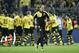 Dortmund head coach Thomas Tuchel runs on the pitch after the German Bundesliga soccer match between Borussia Dortmund and FC Schalke 04 in Dortmund, Germany, Sunday, Nov. 8, 2015. Dortmund defeated Schalke by 3-2. (AP Photo/Martin Meissner)