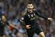 Juventus' Alvaro Morata celebrates after scoring his sides second goal during the Champions League group D soccer match between Manchester City and Juventus at the Etihad Stadium, Manchester, England, Tuesday, Sept. 15, 2015. (AP Photo/Jon Super)