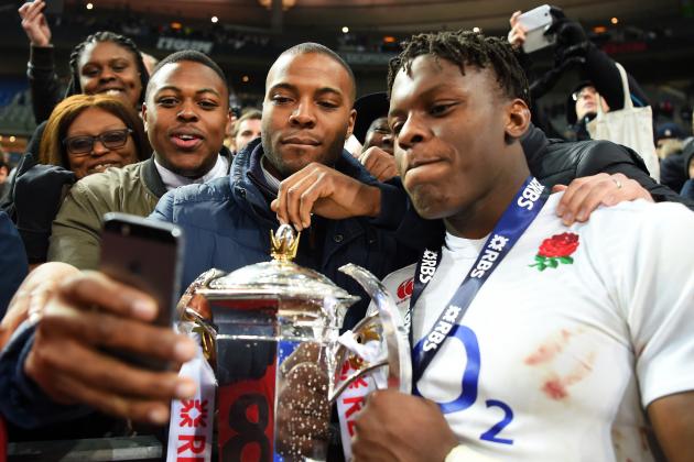 PARIS, FRANCE - MARCH 19:  Maro Itoje of England celebrates with the trophy following his team's 31-21 victory during the RBS Six Nations match between France and England at the Stade de France on March 19, 2016 in Paris, France.  (Photo by Shaun Botterill/Getty Images)