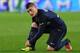 Paris Saint-Germain's Italian midfielder Marco Verratti ties his shoelaces during the French L1 football match between Paris Saint-Germain and Rennes at the Parc des Princes stadium in Paris on April 29, 2016. / AFP / FRANCK FIFE (Photo credit should read FRANCK FIFE/AFP/Getty Images)