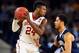 Apr 2, 2016; Houston, TX, USA; Oklahoma Sooners guard Buddy Hield (24) handles the ball against Villanova Wildcats guard Josh Hart (3) during the first half in the 2016 NCAA Men's Division I Championship semi-final game at NRG Stadium. Mandatory Credit: Bob Donnan-USA TODAY Sports