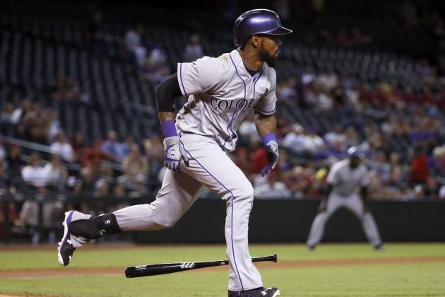 Colorado Rockies shortstop Jose Reyes follows through on a base hit against the Arizona Diamondbacks during the first inning of a baseball game, Thursday, Oct. 1, 2015, in Phoenix. (AP Photo/Matt York)