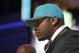 Mississippi’s Laremy Tunsil poses for photos after being selected by the Miami Dolphins as the 13th pick in the first round of the 2016 NFL football draft, Thursday, April 28, 2016, in Chicago. (AP Photo/Charles Rex Arbogast)