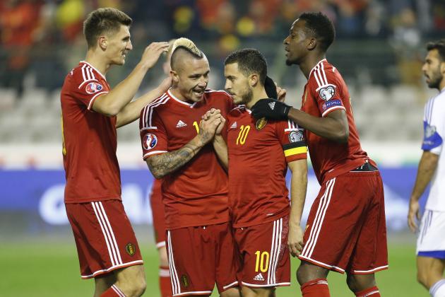 BRUSSELS, BELGIUM - OCTOBER 13: Eden Hazard of Belgium #10 celebrates his goal with Thomas Meunier, Radja Nainggolan and Divock Origi of Belgium during the UEFA EURO 2016 qualifier match between Belgium and Israel at King Baudouin Stadium (Stade du Roi Baudouin) on October 13, 2015 in Brussels, Belgium. (Photo by Jean Catuffe/Getty Images)