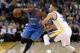 OAKLAND, CA - MARCH 03: Kevin Durant #35 of the Oklahoma City Thunder tries to dribble past Stephen Curry #30 of the Golden State Warriors at ORACLE Arena on March 3, 2016 in Oakland, California. NOTE TO USER: User expressly acknowledges and agrees that, by downloading and or using this photograph, User is consenting to the terms and conditions of the Getty Images License Agreement. (Photo by Ezra Shaw/Getty Images)