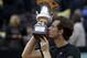Andy Murray kisses the trophy after beating Novak Djokovic 6-3, 6-3 in the final match of the Italian Open tennis tournament, in Rome, Sunday, May 15, 2016. (AP Photo/Alessandra Tarantino)