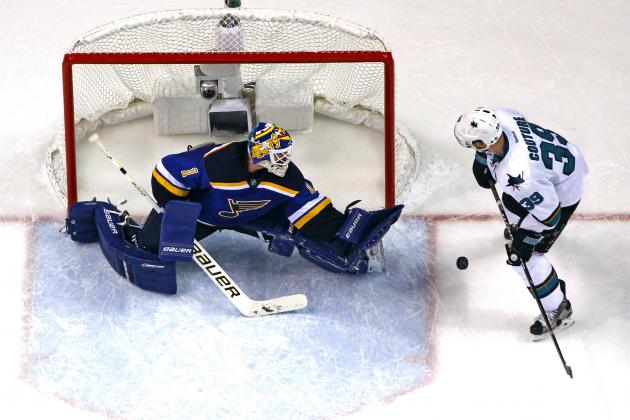 May 15, 2016; St. Louis, MO, USA; St. Louis Blues goalie Brian Elliott (1) blocks a shot by San Jose Sharks center Logan Couture (39) during the third period in game one of the Western Conference Final of the 2016 Stanley Cup Playoffs at Scottrade Center. The Blues won the game 2-1. Mandatory Credit: Billy Hurst-USA TODAY Sports