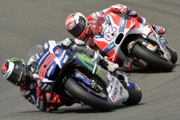 Spain's rider Jorge Lorenzo competes on his Movistar Yamaha MOTOGP N 99 ahead of Italy's rider Andrea Dovizioso on his Ducati N 4 in the MotoGP race during the French motorcycling Grand Prix, on May 8, 2016 in Le Mans, northwestern France. / AFP / JEAN-FRANCOIS MONIER (Photo credit should read JEAN-FRANCOIS MONIER/AFP/Getty Images)