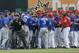 Texas Rangers and Toronto Blue Jays tussle during the eighth inning of a baseball game in Arlington, Texas, Sunday, May 15, 2016. (AP Photo/LM Otero)