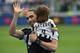 TURIN, ITALY - MAY 14: Martin Caceres of Juventus FC with his children celebrates after beating UC Sampdoria 5-0 to win the Serie A Championships after the Serie A match between Juventus FC and UC Sampdoria at Juventus Arena on May 14, 2016 in Turin, Italy. (Photo by Valerio Pennicino/Getty Images)