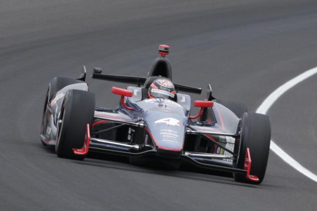 JR Hildebrand drives through the first turn during practice for the Indianapolis 500 auto race at the Indianapolis Motor Speedway in Indianapolis, Friday, May 17, 2013. (AP Photo/AJ Mast)