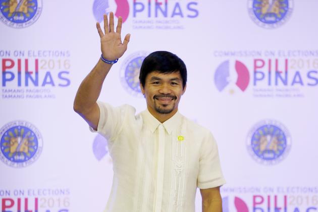 Filipino boxing great and now Senator Manny Pacquiao waves following his proclamation as the Seventh Senator in ceremony at the Commission on Elections Thursday, May 19, 2016 in suburban Pasay city south of Manila, Philippines. Pacquiao has won a seat in the Philippine Senate based on an unofficial count bringing him closer to a possible crack at the presidency. Pacquiao said he will retire from boxing to become a full-time politician. (AP Photo/Bullit Marquez)