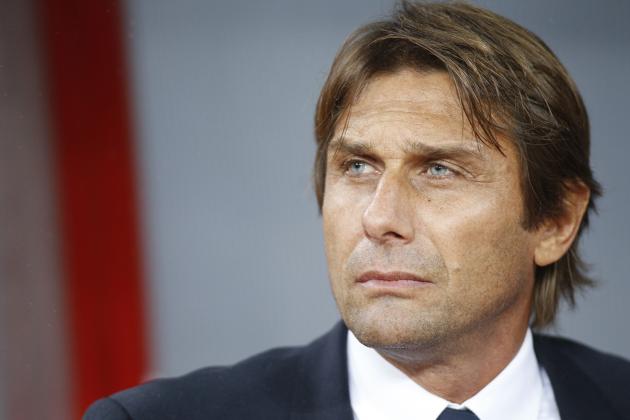 Italy's head coach Antonio Conte watches his team as they line up prior to the Euro 2016 soccer qualifying group H match between the Azerbaijan and Italy at the Olympic stadium in Baku, Azerbaijan, Saturday, Oct. 10, 2015. (AP Photo/Mindaugas Kulbis)
