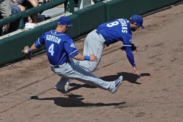 CHICAGO, IL - MAY 22:  Alex Gordon #4 and Mike Moustakas #8 of the Kansas City Royals collide going for a foul ball against the Chicago White Sox at U.S. Cellular Field on May 22, 2016 in Chicago, Illinois. The White Sox defeated the Royals 3-2.  (Photo by Jonathan Daniel/Getty Images)