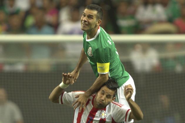 Rafael Marquez of Mexico (R) vies for the ball with Jorge Benitez (L) of Paraguay during the friendly match between the Mexican national team and Paraguay national team at the Georgia Dome in Atlanta, Georgia on May 28, 2016. / AFP / VICTOR STRAFFON        (Photo credit should read VICTOR STRAFFON/AFP/Getty Images)