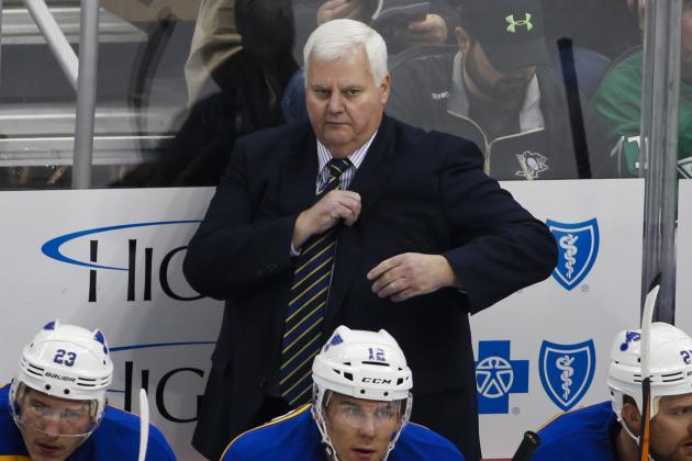 St. Louis Blues head coach Ken Hitchcock  stands behind his bench during an NHL hockey game against the Pittsburgh Penguins in Pittsburgh Wednesday, Nov. 25, 2015.(AP Photo/Gene J. Puskar)