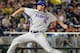 Florida starting pitcher A.J. Puk delivers against Virginia during the first inning of an NCAA College World Series baseball game in Omaha, Neb., Monday, June 15, 2015. (AP Photo/Ted Kirk)