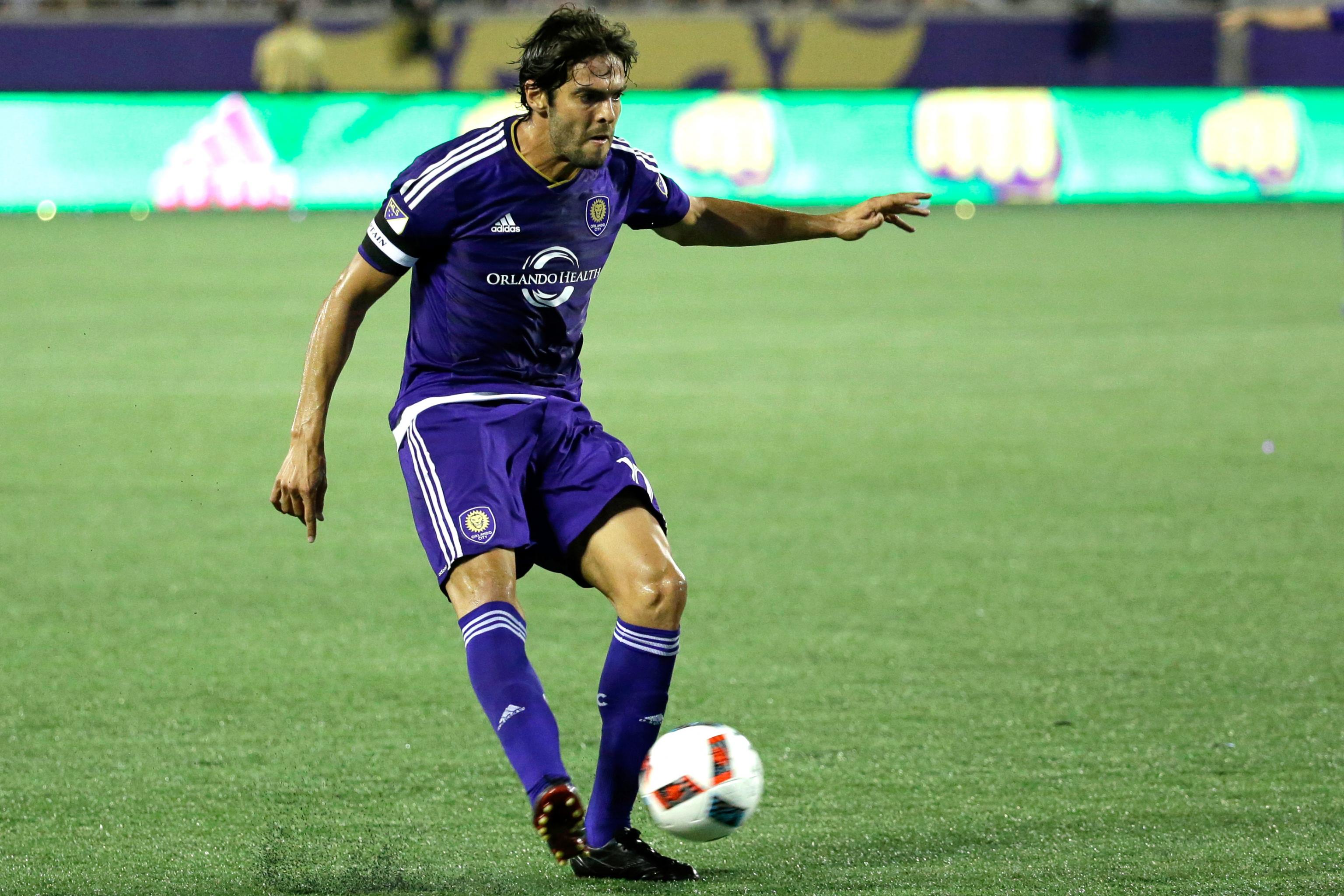 Brazilian soccer star Kaka smiles as he arrives at Orlando International  Airport, Monday, June 30, 2014, in Orlando, Fla. Kaka is the first  designated player to sign with the Orlando City Soccer