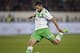 Wolfsburg's Ricardo Rodriguez plays the ball during the German Bundesliga soccer match between VfL Wolfsburg and and Bayer 04 Leverkusen in Wolfsburg, Germany, Saturday, Oct. 31, 2015. (AP Photo/Michael Sohn)