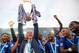 LEICESTER, ENGLAND - MAY 07: Claudio Ranieri Manager of Leicester City lifts the Premier League Trophy as players celebrate the season champions after the Barclays Premier League match between Leicester City and Everton at The King Power Stadium on May 7, 2016 in Leicester, United Kingdom. (Photo by Michael Regan/Getty Images)