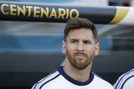 Argentina’s Lionel Messi stands near the bench with teammates before the start of a Copa America Centenario Group A soccer match between Argentina and Chile at the Levi's Stadium in Santa Clara, Calif., Monday, June 6, 2016. (AP Photo/ Marcio Jose Sanchez)