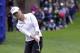 Lydia Ko, of New Zealand, chips onto the 17th green in the third round at the Women's PGA Championship golf tournament at Sahalee Country Club, Saturday, June 11, 2016, in Sammamish, Wash. (AP Photo/Elaine Thompson)