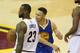 Golden State Warriors guard Stephen Curry reacts to being called for his sixth foul on Cleveland Cavaliers forward LeBron James (23) during the second half of Game 6 of basketball's NBA Finals in Cleveland, Thursday, June 16, 2016. (AP Photo/Ron Schwane)