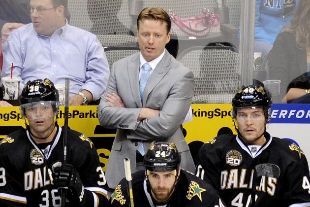FILE- In this April 25, 2013, file photo, Dallas Stars head coach Glen Gulutzan watches play from behind the bench during the second period of an NHL hockey game against the Columbus Blue Jackets in Dallas. The Stars fired Gulutzan on Tuesday, May 14, 2013, after he failed to make the playoffs in two seasons at the helm. (AP Photo/Matt Strasen, File)