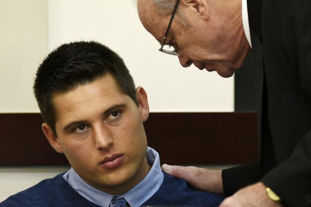 Defendant Brandon Vandenburg, a former Vanderbilt football player, listens to his attorney Randall Reagan during his retrial, Monday, June 13, 2016, in Nashville, Tenn. A jury convicted Vandenburg and former player Corey Batey last year after a trial that featured graphic cellphone videos and photos of the attack taken by the former players. However, the verdicts were thrown out after it was discovered that the jury foreman had been a victim of statutory rape. (George Walker IV/The Tennessean via AP, Pool)