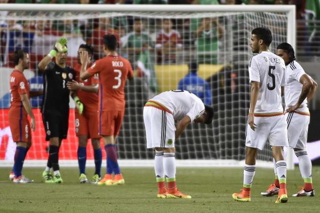 Chilean players (L) celebrate as Mexican players react in dejection after the Copa America Centenario quarterfinal football match in Santa Clara, California, United States, on June 18, 2016. 
Chile defeated Mexico by 7-0 and qualified for semi-finals. / AFP / OMAR TORRES        (Photo credit should read OMAR TORRES/AFP/Getty Images)