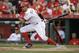 Cincinnati Reds' Billy Hamilton hits a single off St. Louis Cardinals starting pitcher Mike Leake in the second inning of a baseball game, Tuesday, June 7, 2016, in Cincinnati. The Reds won 7-6. (AP Photo/John Minchillo)