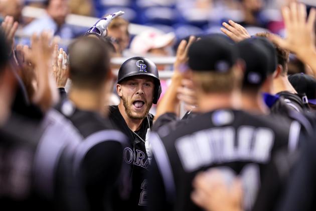 MIAMI, FL - JUNE 20: Trevor Story #27 of the Colorado Rockies celebrates with teammates after hitting a solo home run during the second inning of the game against the Miami Marlins at Marlins Park on June 20, 2016 in Miami, Florida. (Photo by Rob Foldy/Getty Images)