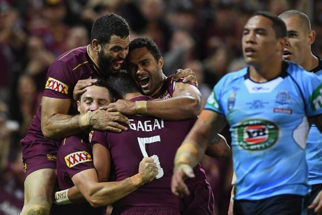 BRISBANE, AUSTRALIA - JUNE 22:  Dane Gagai of the Maroons celebrates scoring a try with Cooper Cronk, Greg Inglis and Justin O'Neill of the Maroons during game two of the State Of Origin series between the Queensland Maroons and the New South Wales Blues at Suncorp Stadium on June 22, 2016 in Brisbane, Australia.  (Photo by Matt Roberts/Getty Images)