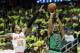 Boston Celtics' Avery Bradley, right, shoots in front of Atlanta Hawks' Kent Bazemore in the first quarter in Game 1 of a first-round NBA basketball playoff series Saturday, April 16, 2016, in Atlanta. (AP Photo/David Goldman)