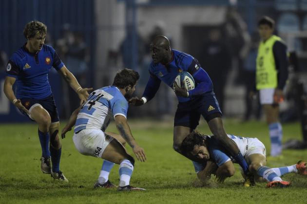 France's wing Djibril Camara (2-R) is tackled by Argentina's Los Pumas fly half Nicolas Sanchez (R) and wing Santiago Cordero (C) during their Rugby Union test match at the Jose Fierro stadium in Tucuman, Argentina, on June 19, 2016. Argentina won 30-19. / AFP / JUAN MABROMATA        (Photo credit should read JUAN MABROMATA/AFP/Getty Images)