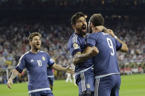 Argentina forward Gonzalo Higuain (9) celebrates his goal against the United States with midfielder Lionel Messi, left, and  forward Ezequiel Lavezzi, center, during a Copa America Centenario semifinal soccer match, Tuesday, June 21, 2016, in Houston. Argentina won 4-0. (AP Photo/Eric Gay)