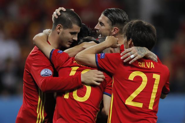 Spain's Alvaro Morata, left, celebrates after scoring his side’s third goal during the Euro 2016 Group D soccer match between Spain and Turkey at the Allianz Riviera stadium in Nice, France, Friday, June 17, 2016. (AP Photo/Manu Fernandez)