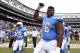 San Diego Chargers offensive guard D.J. Fluker (76) reacts to fans before an NFL football game against the Oakland Raiders Sunday, Oct. 25, 2015, in San Diego. (AP Photo/Denis Poroy)