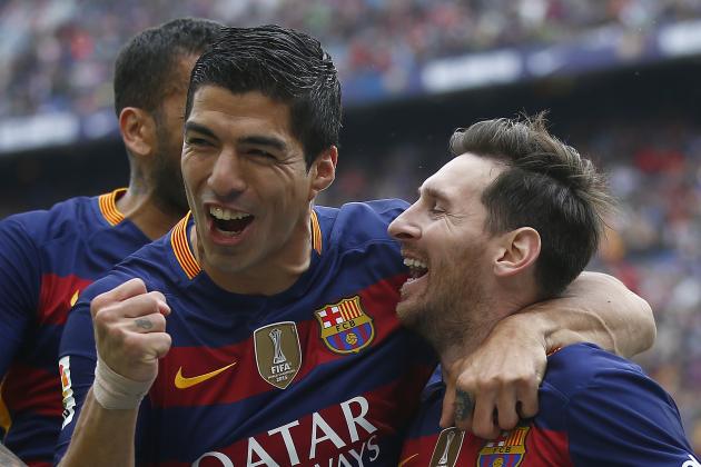FC Barcelona's Lionel Messi, right, reacts after scoring with his teammate Luis Suarez during a Spanish La Liga soccer match between FC Barcelona and Espanyol at the Camp Nou stadium in Barcelona, Spain, Sunday, May 8, 2016. (AP Photo/Manu Fernandez)