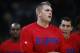 Los Angeles Clippers center Cole Aldrich (45) warms up before facing the Denver Nuggets in the first half of an NBA basketball game Tuesday, Nov. 24, 2015, in Denver. (AP Photo/David Zalubowski)