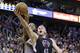 Los Angeles Clippers center Cole Aldrich (45) lays the ball up as Utah Jazz forward Derrick Favors, rear, defends during the second half of an NBA basketball game Friday, April 8, 2016, in Salt Lake City. The Clippers won 102-99 in overtime. (AP Photo/Rick Bowmer)