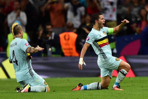 Belgium's forward Eden Hazard (R) celebrates after scoring his team's third goal  during the Euro 2016 round of 16 football match between Hungary and Belgium at the Stadium Municipal in Toulouse on June 26, 2016.   / AFP / Attila KISBENEDEK        (Photo credit should read ATTILA KISBENEDEK/AFP/Getty Images)