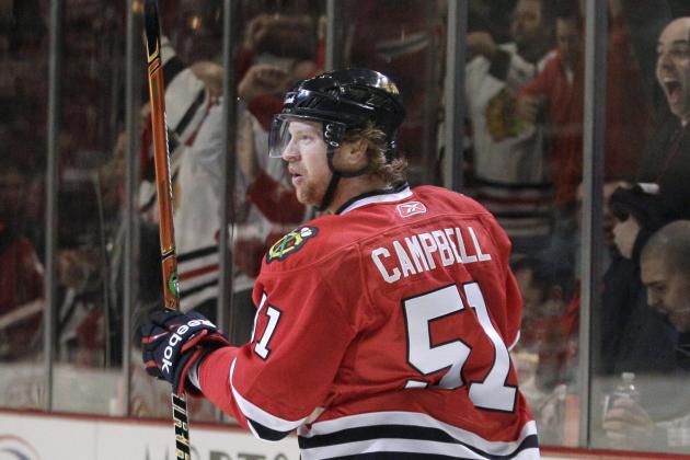 Chicago Blackhawks defenseman Brian Campbell reacts after scoring a goal during the second period in Game 4 of an NHL hockey Stanley Cup playoffs first-round series against the Vancouver Canucks on Tuesday, April 19, 2011, in Chicago. (AP Photo/Nam Y. Huh)