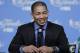 Cleveland Cavaliers coach Tyronn Lue smiles while talking with the media after Game 3 of basketball's NBA Finals in Cleveland, early Thursday, June 9, 2016. Cleveland defeated the Golden State Warriors 120-90. (AP Photo/Tony Dejak)