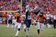 DENVER, CO - JANUARY 24: Rob Gronkowski #87 of the New England Patriots makes a catch on fourth down against Chris Harris #25 and Josh Bush #20 of the Denver Broncos in the fourth quarter in the AFC Championship game at Sports Authority Field at Mile High on January 24, 2016 in Denver, Colorado. (Photo by Doug Pensinger/Getty Images)